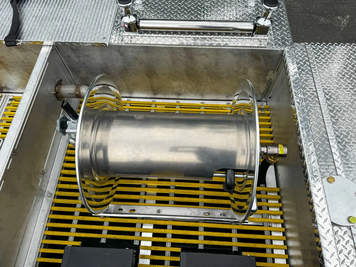 Elevated forward view from top deck toward the cab roof.